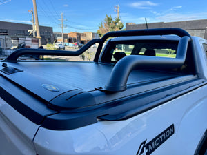 Extended sports bar for UniUte Gen2/EGen2 roller shutters — matte black bar fitted on ute | UniUte