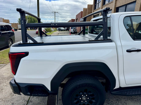 Ladder rack for roller cover — close-up of adjustable clamping bracket detail