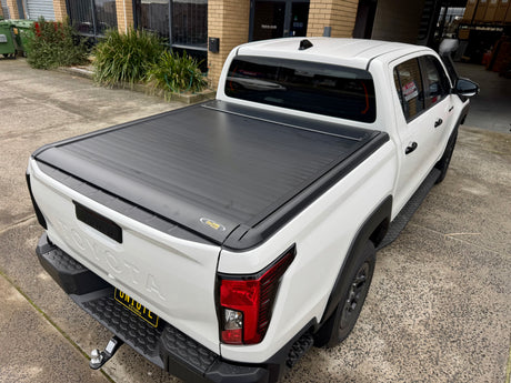 Electric roller shutter for Toyota Hilux N80 N90 2015–2026 — installed closed over the tub | UniUte