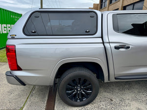 Triton MV canopy — side window open showing ventilation and access