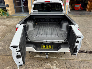 GWM Cannon Alpha electric roller shutter — parked showing full bed coverage