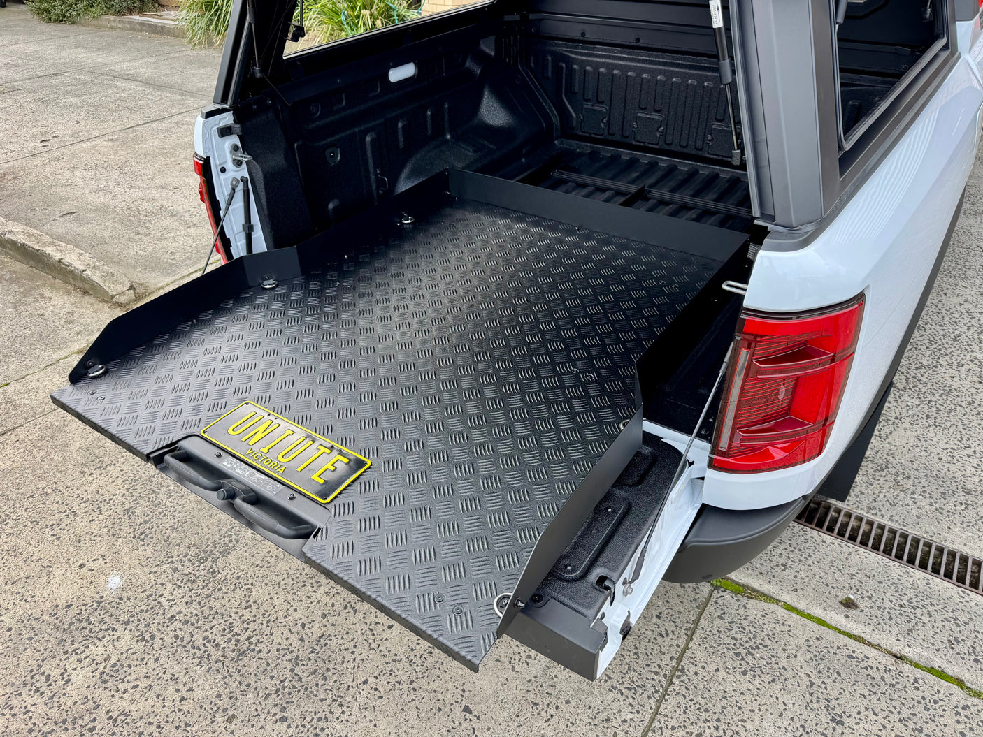 Sliding tray for BYD Shark 6 2025+ — fully extended from the tub showing complete cargo access | UniUte
