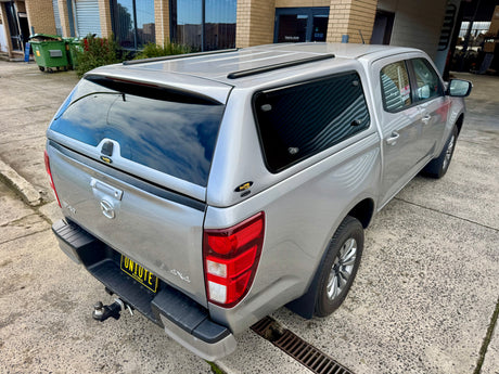 Mazda BT-50 fibreglass canopy — rear three-quarter view showing the door and profile