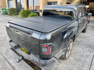 KIA Tasman tri-fold hard lid 2025+ — installed closed view | UniUte