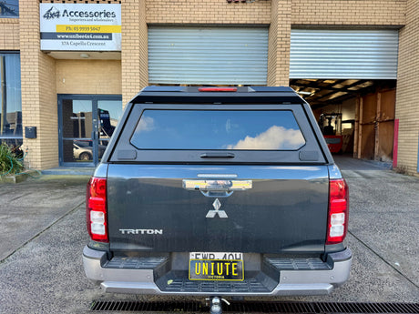 Mitsubishi Triton MV canopy — roof rail and central brake light detail