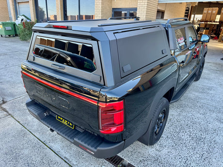 Stainless steel canopy for BYD Shark 6 2025+ — installed on white ute front three-quarter view | UniUte