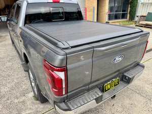 Ford F-150 electric roller shutter — close-up of the double-walled aluminium slat profile