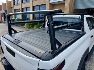 Heavy duty aluminium ladder rack for roller covers — installed on ute showing full rack height | UniUte