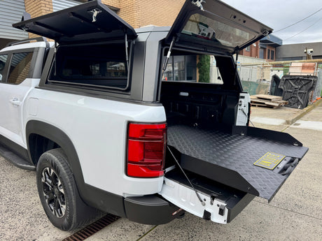 BYD Shark 6 2025+ sliding tray — retracted and locked flush in the ute tub