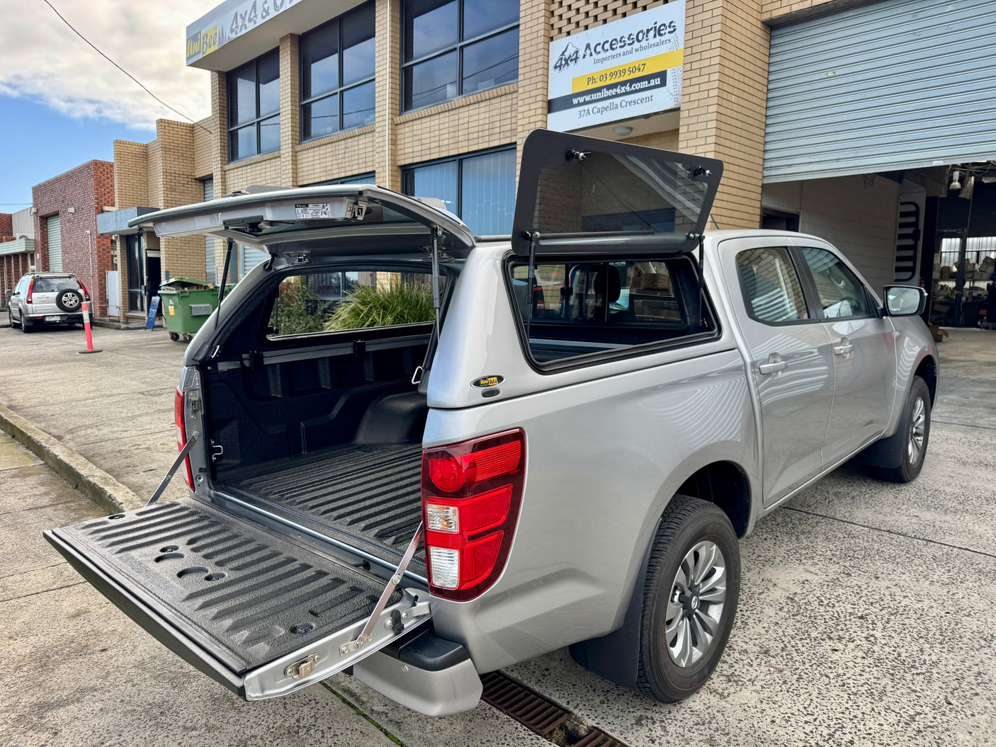 Mazda BT-50 canopy — close-up of the weather seals and rear door latch