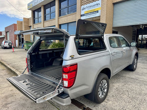 Mazda BT-50 canopy — close-up of the weather seals and rear door latch