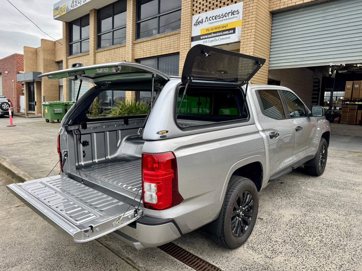 Triton MV fibreglass canopy — rear view with the door closed