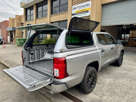 Triton MV fibreglass canopy — rear view with the door closed
