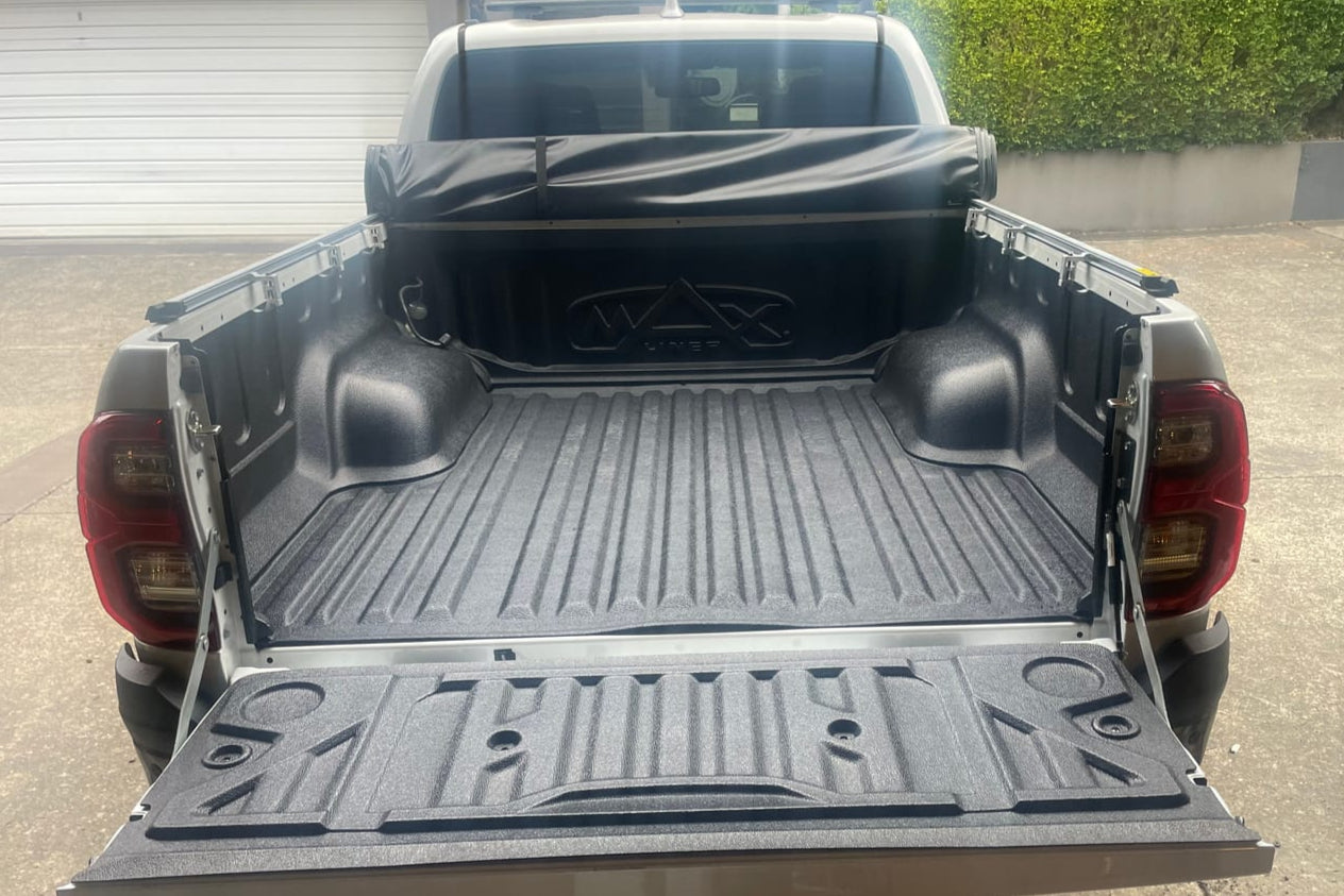 Hilux tonneau cover installed on Toyota SR5 2015-2025 showcasing soft roll up feature