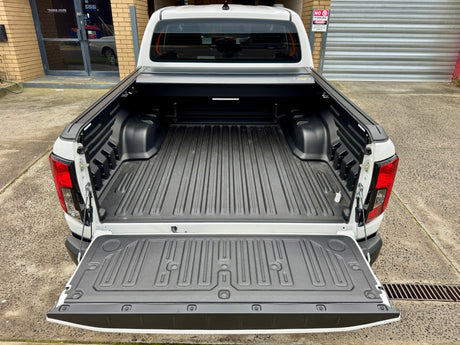 UniUte electric roller shutter for Toyota Hilux N80 N90 2015–2026 — fitted on a dual cab ute