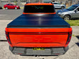 BYD Shark 6 Hard Lid 2025+ Tri-Fold Hard Tonneau Cover on Red Truck