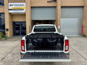 Universal ute tub hammock — stretched across tray rails showing load position