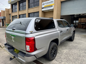 Mitsubishi Triton MV 2024+ canopy — front three-quarter view showing roofline