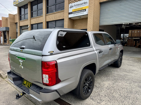 Mitsubishi Triton MV 2024+ canopy — front three-quarter view showing roofline