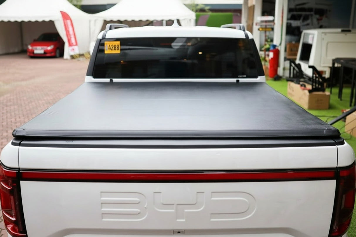 BYD Shark 6 with UniUte Tri-Fold Soft Tonneau Cover for 2025+, showcasing sleek design and weather protection. byd shark 6 tonneau cover