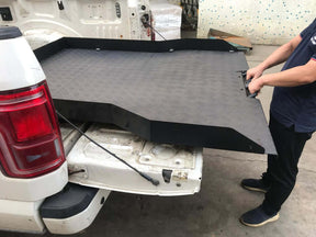 Sliding tray for Ford F-150 5.5 bed — being installed in truck bed | UniUte