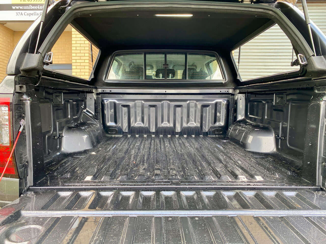 Interior view of Ford Ranger canopy RA NextGen 2022-2025 FORCE PRO design showing spacious cargo area, focus keyword: ford ranger canopy.