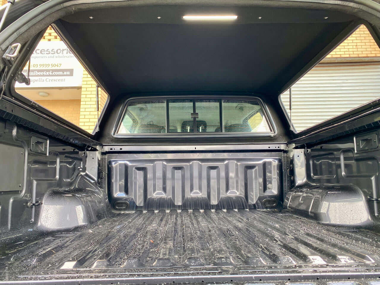 Interior view of Ford Ranger Canopy FORCE PRO for NextGen RA 2022-2025 showcasing spacious and robust design for dual cab models.