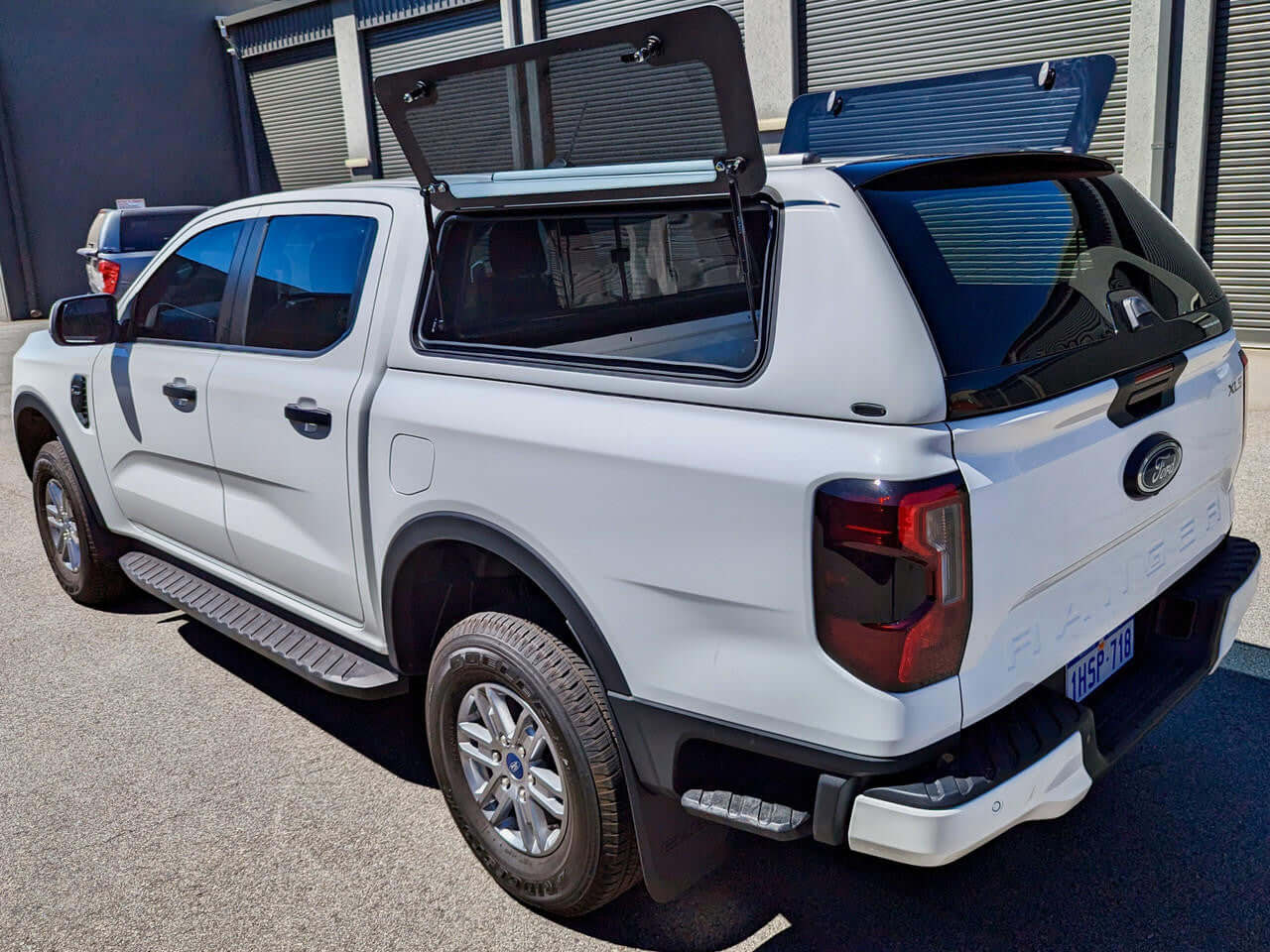 Ford Ranger with UniUte FORCE PRO ford ranger canopy NextGen 2022-2025, showcasing versatility and style on a sunny day
