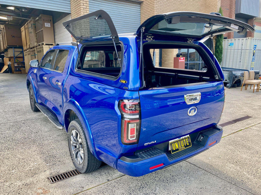 UniUte FORCE PRO gwm cannon canopy on blue GWM Cannon Ute 2020-2025, showcasing rear and side views with open canopy doors.
