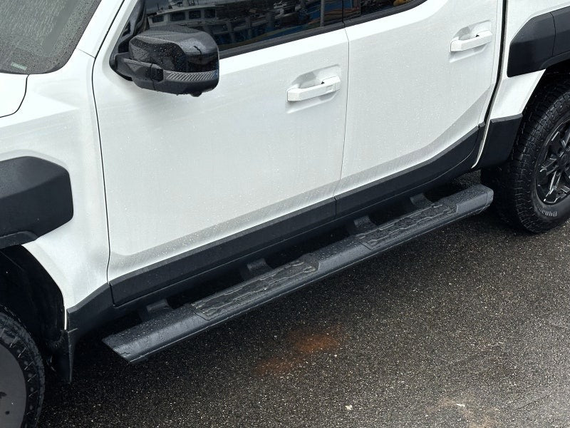 KIA Tasman Side Steps 2025+ Black Side Bars shown on vehicle