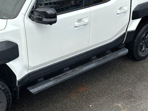 KIA Tasman Side Steps 2025+ Black Side Bars shown on vehicle
