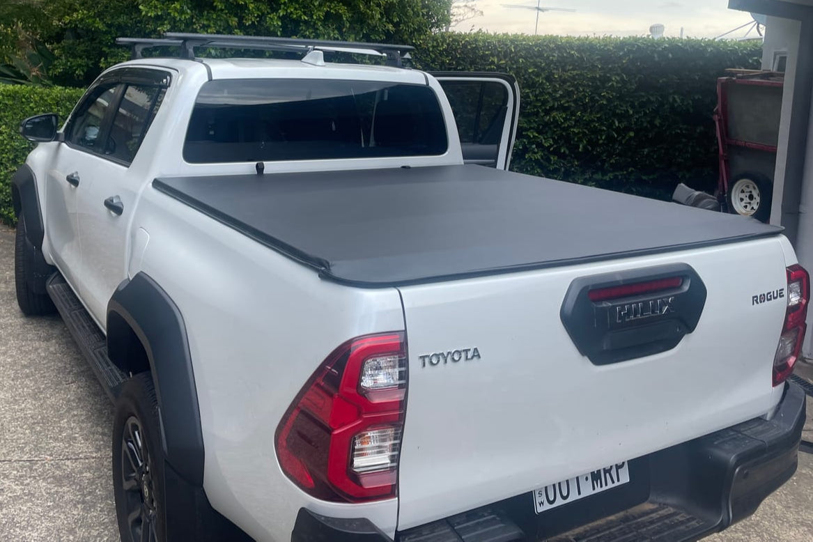 hilux tonneau cover on Toyota Hilux SR5 2015-2025, soft roll-up for optimal protection and easy installation.