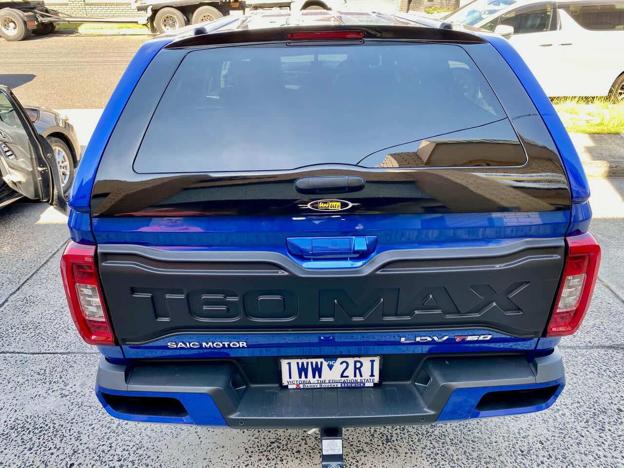 Blue LDV T60 canopy parked in driveway, rear view showcasing ultimate protection and style
