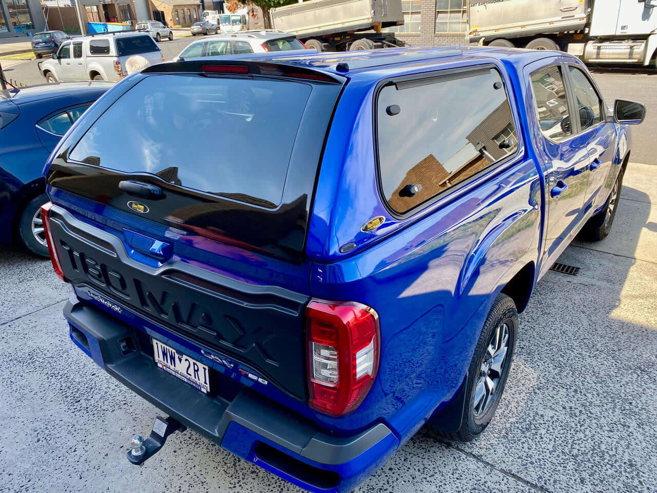 Blue LDV T60 canopy 2017-2025 by UniUte FORCE PRO, showcasing ultimate protection and style in an urban setting.