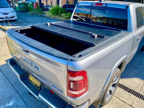 Quad-fold hard lid for RAM 1500 DT 5.7 bed 2020-2026 — installed closed | UniUte