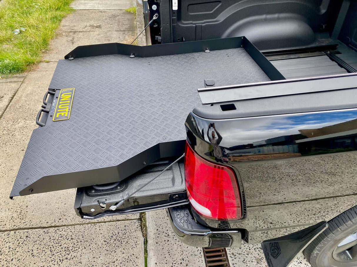 Ute sliding tray installed on a RAM 1500 5'7" for enhanced utility and convenience.