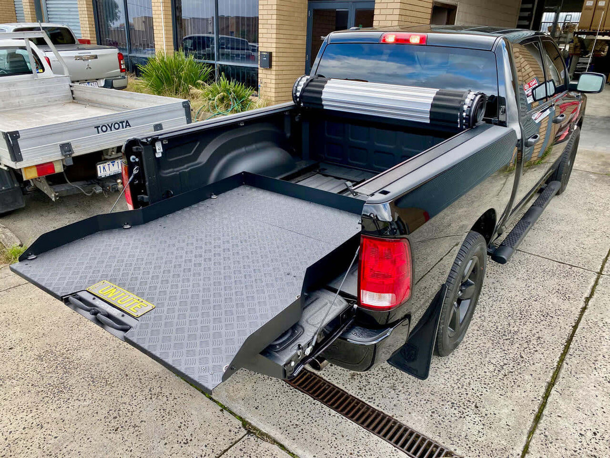 RAM 1500 with UniUte ute sliding tray for 5.7' bed showcasing enhanced cargo accessibility.