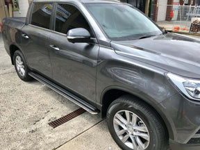 Elegance running boards for SsangYong Musso 2018-2026 — installed side view | UniUte