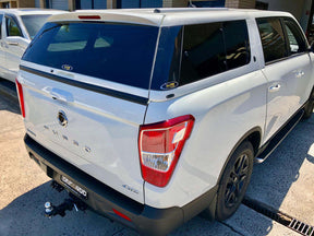 Fibreglass canopy for SsangYong Musso short tub 2018-2026 — side view on silver ute | UniUte