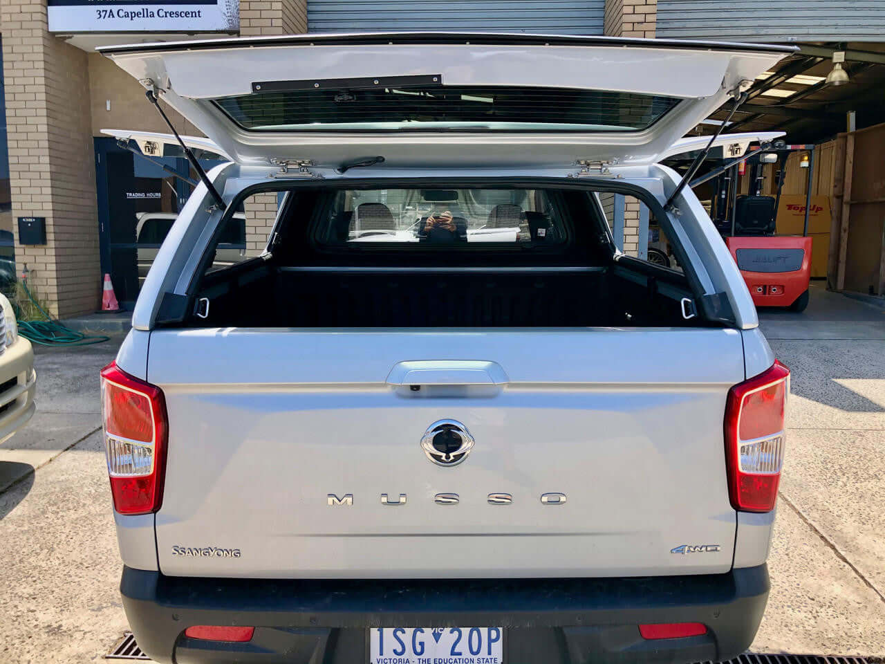SsangYong Musso XLV Canopy open on pickup truck