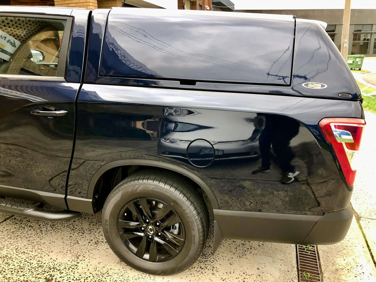 SsangYong Musso XLV Canopy on black pickup truck, showcasing UniUte FORCE PRO PLUS design for enhanced utility and style.