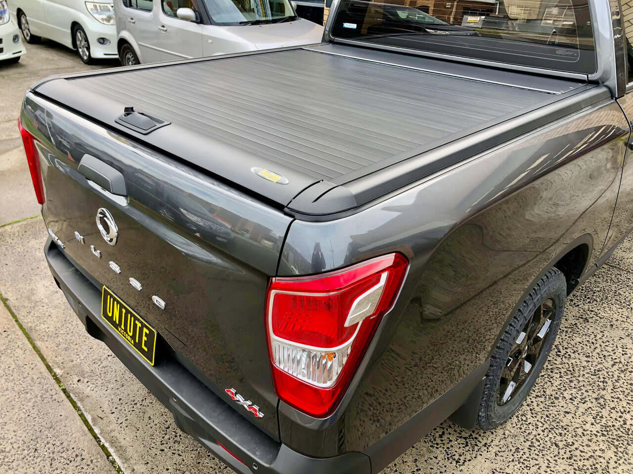 Rear view of a SsangYong Musso 2018+ with KGM Musso Roller Shutter installed for enhanced cargo protection.