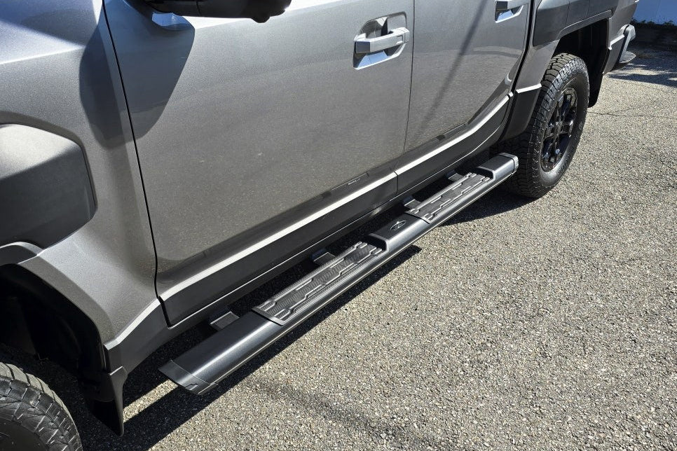 KIA Tasman side steps 2025+ black steel side bars for enhanced access and protection, perfect for off-road and city driving