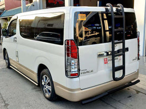Black rear ladder for Toyota HiAce 300 series 2019-2025 — installed rear view | UniUte