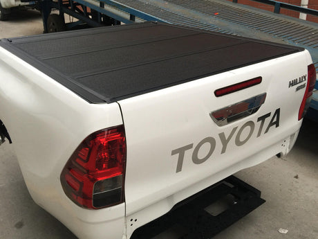 TOYOTA HILUX Quad-Fold Hard Lid Tonneau Cover for Toyota HiLux SR5 2015-2023 