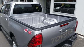 Rail guard caps for Toyota Hilux SR5 2015-2025 — set of 3 installed | UniUte