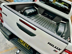 Tailgate guard cap for Toyota Hilux SR5 2015-2025 — installed on tailgate | UniUte