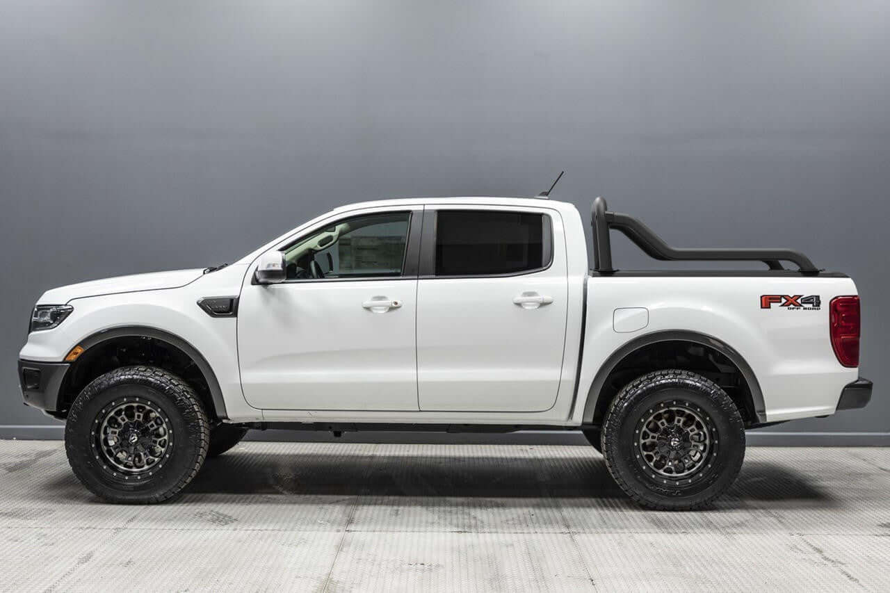 White truck with extended sports bar and matte black finish, designed for Gen2 and EGen2 roller shutters, parked in a studio setting.