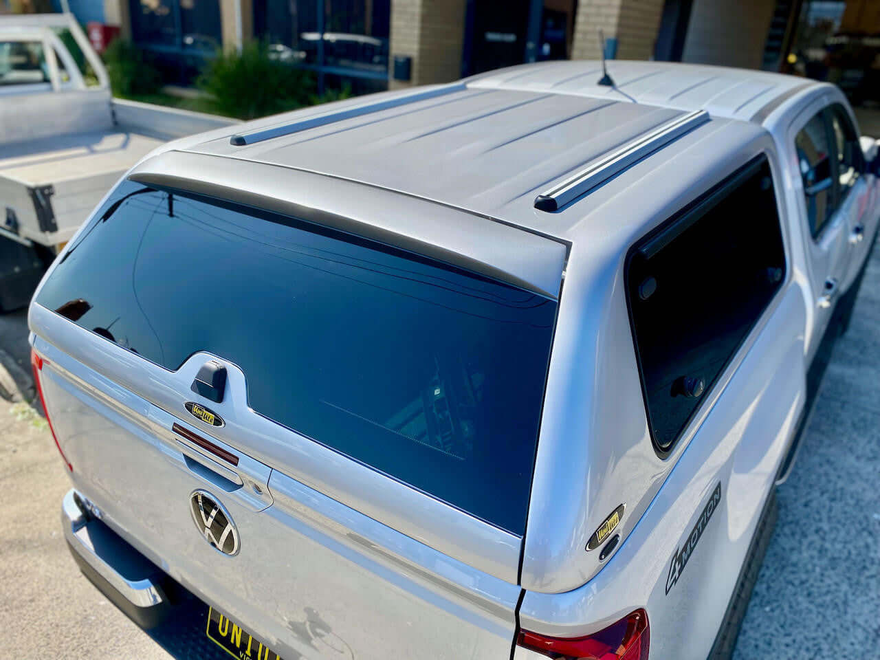 Amarok Canopy FORCE PRO installed on a New Volkswagen 2023+ by UniUte, showcasing sleek design and functionality.
